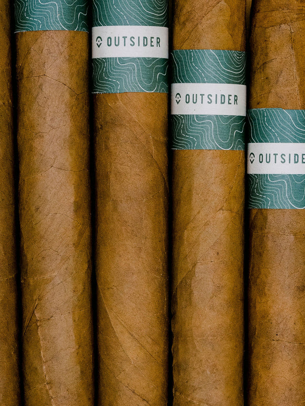 Jay Cutler's Outsider Cigars mild and a little sweet, with a touch of spice, the smokes were blended by Hendrik Kelner Jr, with some of the tobacco grown on the Kelner family farms